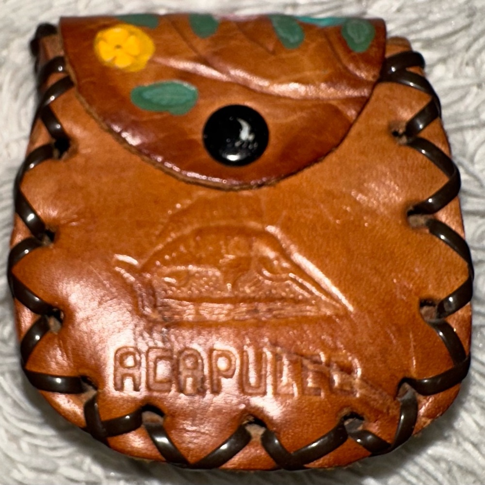Small vintage handmade leather coin purse on necklace from Acapulco